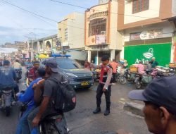Polsek Labuhan Ruku Lakukan Pengaturan Lalu Lintas di Simpang 4 Alwasliyah Tanjung Tiram