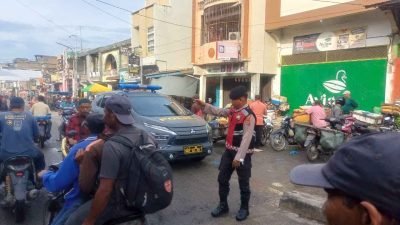 Polsek Labuhan Ruku Lakukan Pengaturan Lalu Lintas di Simpang 4 Alwasliyah Tanjung Tiram