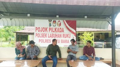 Pojok Pilkada Polsek Labuhan Ruku 2024: Upaya Ciptakan Situasi Kondusif Jelang Pemilihan