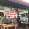 Kapolsek Labuhan Ruku Gelar “Pojok Pilkada” Guna Jaga Kamtibmas Jelang Pemilu 2024