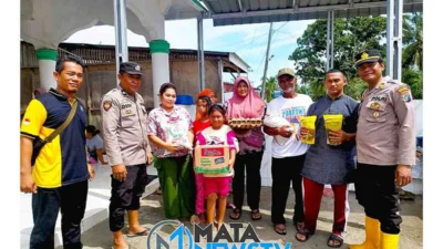 Kapolsek Tanjung Beringin Pantau Genangan Air dan Beri Bantuan kepada Warga