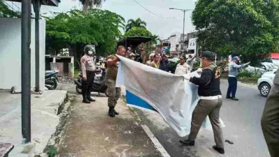 Hari Pertama Masa Tenang, Polres Pematang Siantar Kawal Pembersihan APK di Kota Pematang Siantar