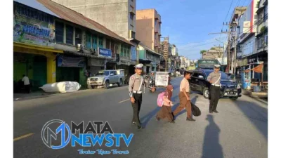 Personel Polsek Kotapinang Laksanakan Gatur Lalin Pagi di Jalinsum, Situasi Aman dan Terkendali