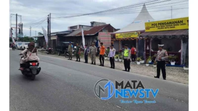 Pengaturan Lalu Lintas di Pospam I Simpang Empat Tanah Merah Berjalan Lancar