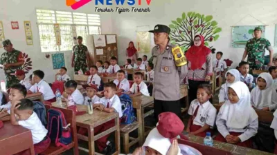 Bhabinkamtibmas Polsek Bosar Maligas Hadiri Pembagian Makan Sehat Bergizi di SDN 091711