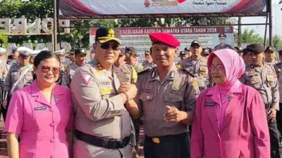 Kapolres Simalungun Pimpin Upacara Bulanan dan Lepas Personel Purna Bakti