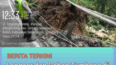 Polres Simalungun Tangani Longsor dan Pohon Tumbang di Jembatan Sibaganding dengan Sigap