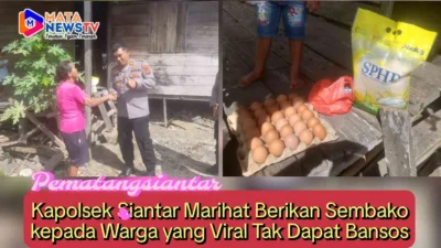 Kapolsek Siantar Marihat Berikan Sembako kepada Warga yang Viral Tak Dapat Bansos