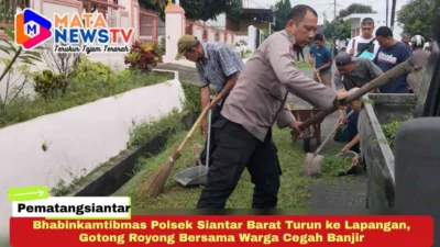 Bhabinkamtibmas Polsek Siantar Barat Turun ke Lapangan, Gotong Royong Bersama Warga Cegah Banjir
